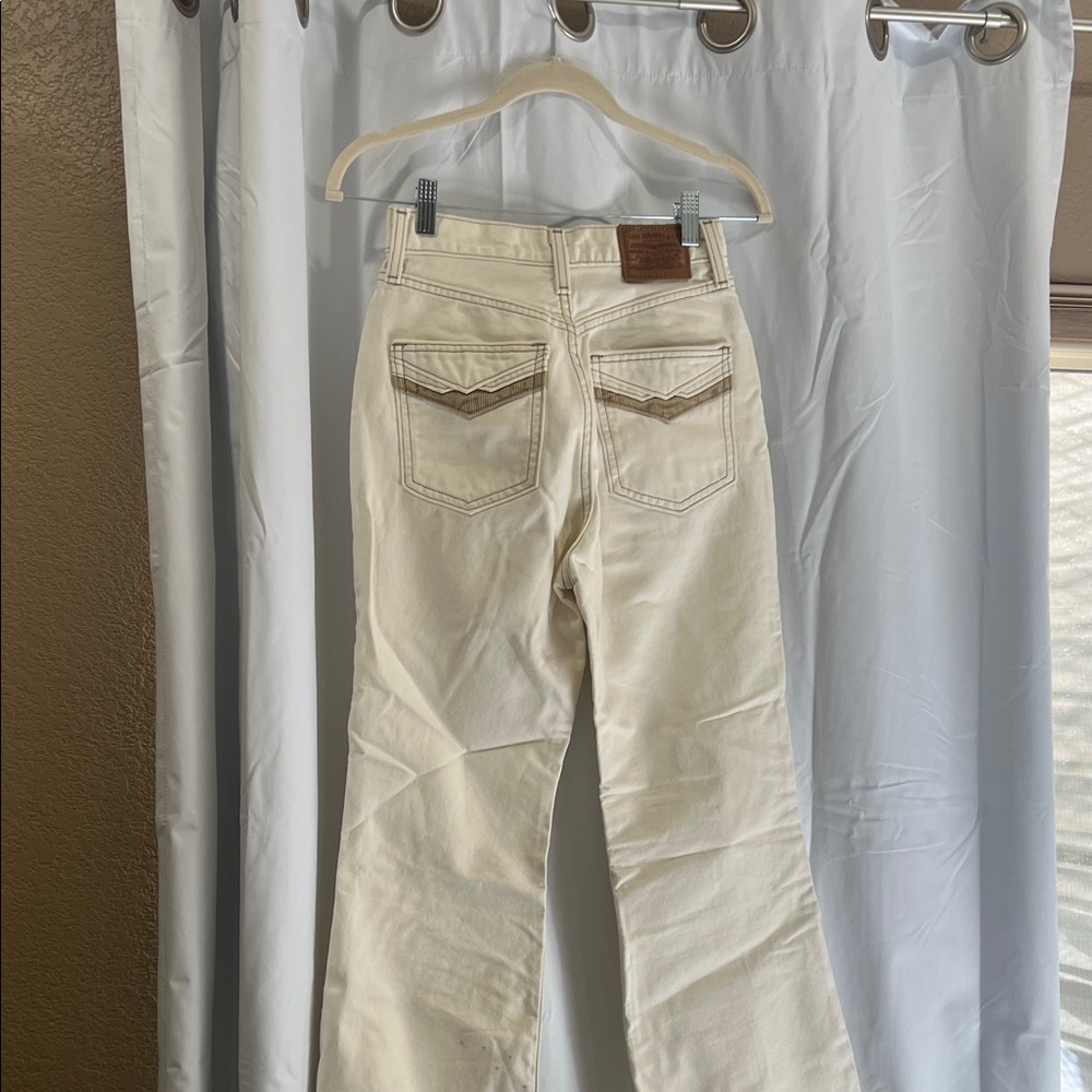 Levi’s Women's Cream High-Rise Jeans - Classic Back Pocket Detail